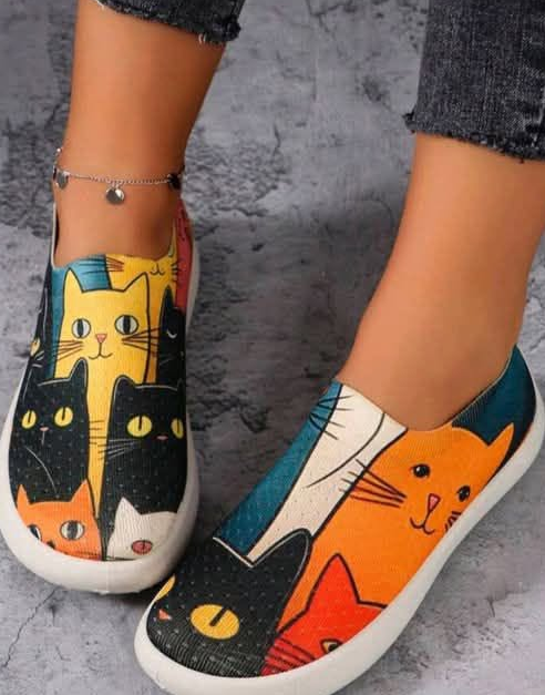 Slip-on jalanõud "Kassid"